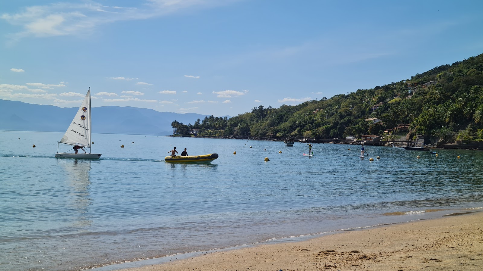 Praia da Armacao'in fotoğrafı geniş bir kıyı şeridi ile birlikte