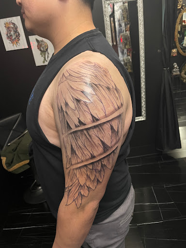 Explore side tattoo ideas, creative tattoo ideas in Utica, available at Watchtower Tattoo Company