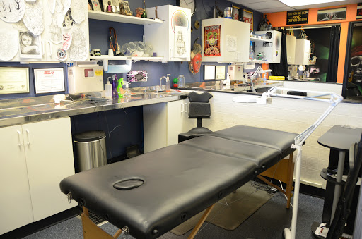 Tattoo Shop «Ageless Art Tattoo & Piercing», reviews and photos, 711 E Lewis and Clark Pkwy, Clarksville, IN 47129, USA