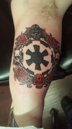 Explore mens rose tattoo ideas, creative tattoo ideas in Forest Lake, available at Dicks Tattoo