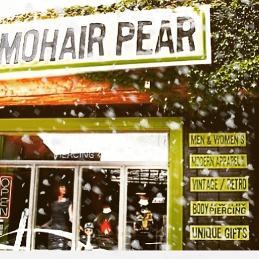 Explore tattoo ideas behind the ear tattoos, creative tattoo ideas in Cedar Falls, available at Mohair Pear