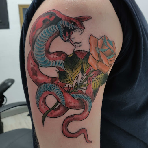 Explore side finger tattoo ideas, creative tattoo ideas in Kissimmee, available at Precision Ink Tattoo Company