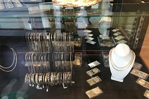 Alpha (Coins, Collectibles and Estates) image