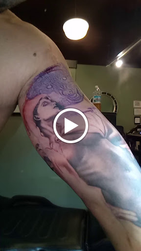 Explore best christian tattoo ideas, creative tattoo ideas in Champaign, available at No Regrets Tattoos & Body Piercing