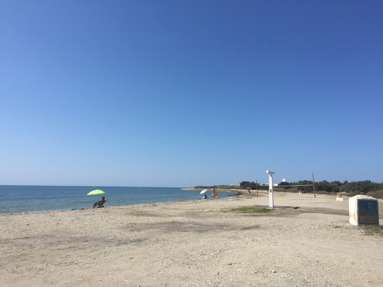 Playa de los Banos的照片 带有蓝色的水表面