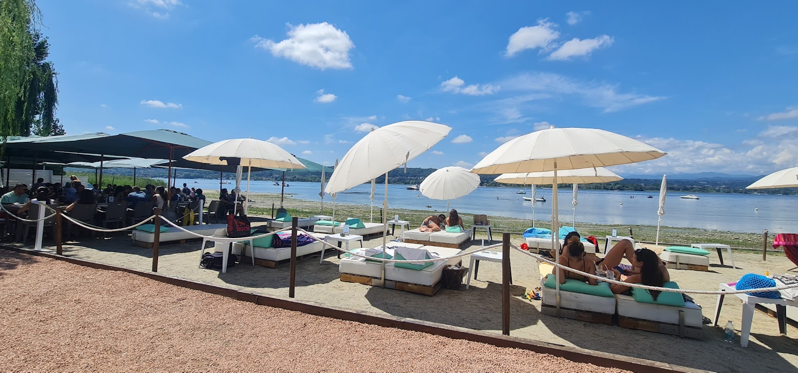 Foto av Spiaggia di Lisanza med blått vatten yta