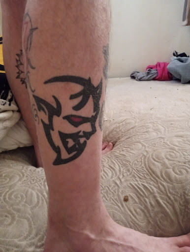 Explore fighting rooster tattoo ideas, creative tattoo ideas in Waterloo, available at Black Lotus Tattoo Studio