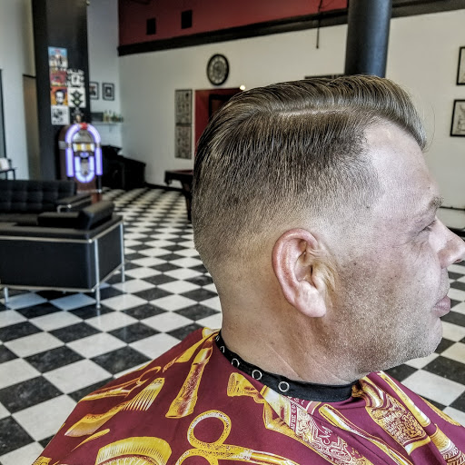 Explore invictus tattoo ideas, creative tattoo ideas in Buffalo, available at The Salty Dog Barbershop