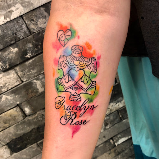 Explore cursive tattoo ideas, creative tattoo ideas in Cape Coral, available at Raabery Ink Society