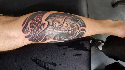 Tattoo Shop «Metropolis Tattoo and Fine Art», reviews and photos, 721 S Elm St Suite 109, Denton, TX 76201, USA