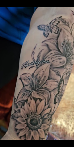 Explore minimalist tattoo ideas with meaning, creative tattoo ideas in Green Bay, available at SPITFIRE CREATIONS