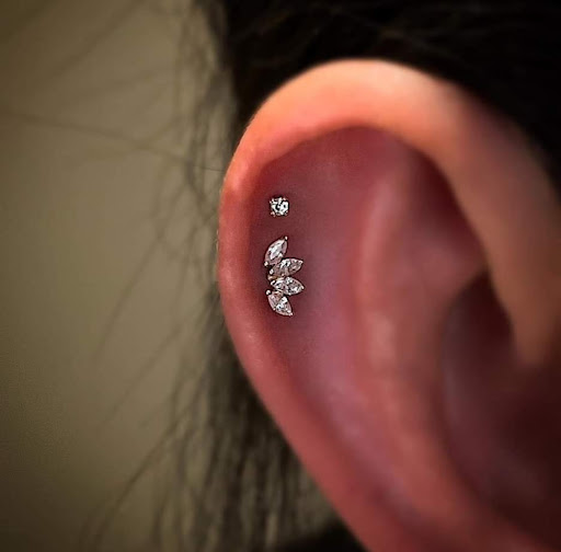 Explore small dinosaur tattoo ideas, creative tattoo ideas in Venice, available at Ink Monkey Tattoo and Piercing