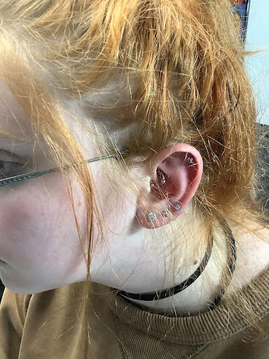 Explore dahlia tattoo ideas, creative tattoo ideas in Whitehall, available at Beachside Tattoos & Smoke Shop