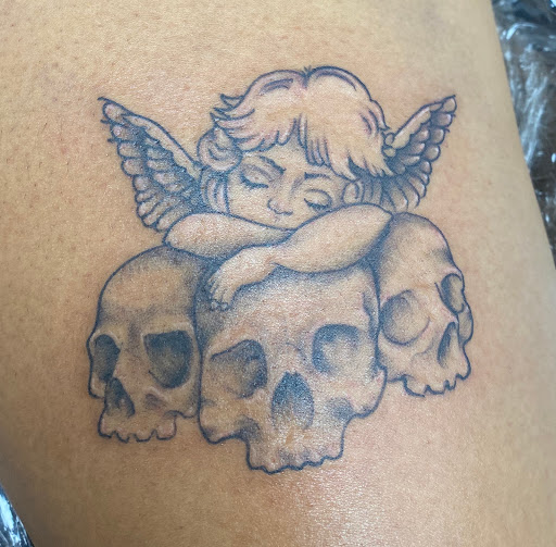 Explore stitch and angel tattoo ideas, creative tattoo ideas in Libertyville, available at Art With Atattooed