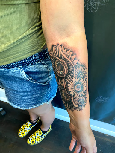 Explore fall leaf tattoo ideas, creative tattoo ideas in Logan, available at Surreal Ink Tattoo & Body Piercing