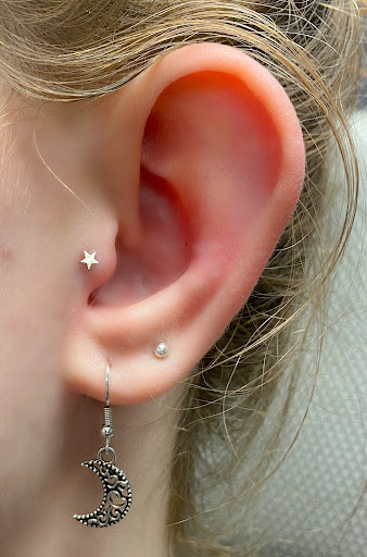 Explore writing tattoo ideas, creative tattoo ideas in Springfield, available at Body Piercing By Qui Qui