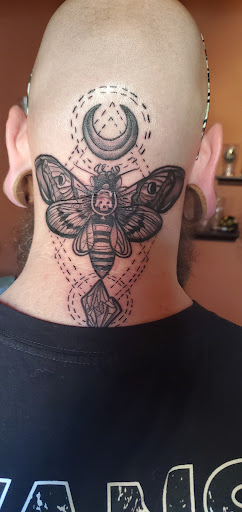 Explore feminine cover up tattoo ideas, creative tattoo ideas in Clovis, available at Anchors & Arrows Tattoos & Piercings