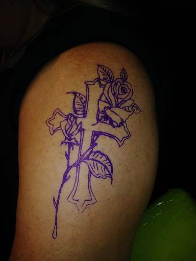 Explore woman sleeve tattoo ideas, creative tattoo ideas in Augusta, available at Shanes Custom Tattoos and Piercings