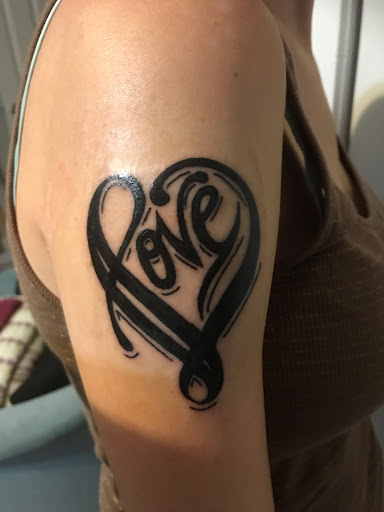 Explore flower wrist tattoo ideas, creative tattoo ideas in Myrtle Beach, available at Aces High Tattoo