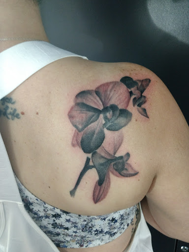 Explore hand tattoo idea, creative tattoo ideas in Omaha, available at Skin Deep Tattoo and Body Piercing