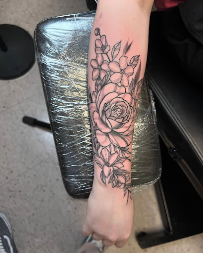 Explore black heart heart tattoo cover up ideas, creative tattoo ideas in Marietta, available at Monkeys Uncle Tattoo