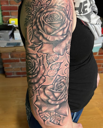 Explore men's neck tattoo ideas, creative tattoo ideas in Butte, available at Ink Therapy