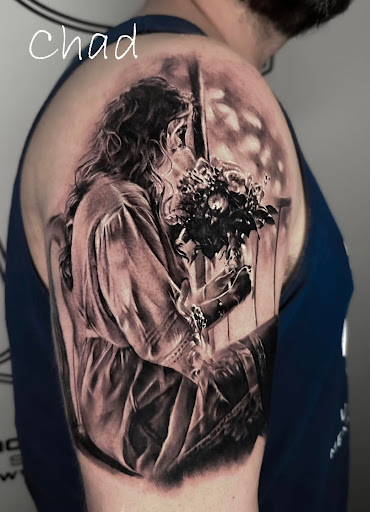 Explore cool upper arm tattoo ideas, creative tattoo ideas in Sanford, available at Venom Ink Tattoo