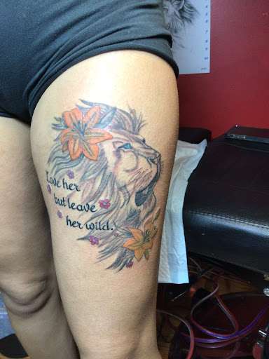 Explore ribbon tattoo ideas, creative tattoo ideas in Jackson, available at Branded By Brittany Ink
