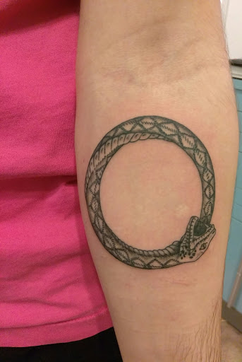 Explore tattoo name cover up ideas, creative tattoo ideas in Hebron, available at Explosive Ink Tattoo