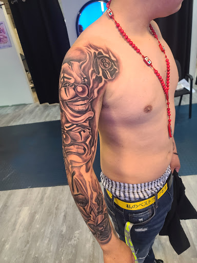 Tattoo Shop «Tattoo Addiction», reviews and photos, 2620 E Washington Ave, Madison, WI 53704, USA