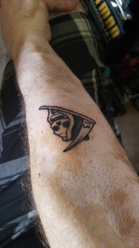 Explore black flower tattoo ideas, creative tattoo ideas in Newport Beach, available at Agape Art Collective