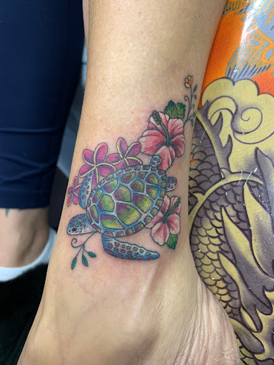 Explore lotus flower tattoo ideas, creative tattoo ideas in Massapequa, available at Crimson culture