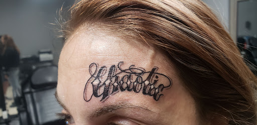 Explore mens upper arm tattoo ideas, creative tattoo ideas in Ocoee, available at Slaughterized Ink Tattoo and Piercing Studio