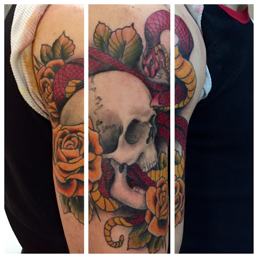Explore religious elbow tattoo ideas, creative tattoo ideas in Reno, available at Aces Tattoo