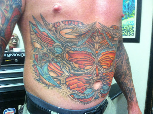 Explore dark tattoo sleeve ideas, creative tattoo ideas in Cottonwood, available at Ink Impression Tattoo