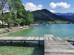 Strandbad Weyregg'in fotoğrafı düz bir kıyı şeridi ile birlikte