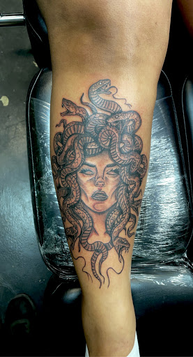 Explore dog tattoo ideas small, creative tattoo ideas in Meridian, available at Creative Pain Tattoo Studio