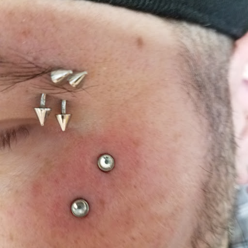 Explore omerta tattoo ideas, creative tattoo ideas in Hudson Falls, available at ALTERED ADDICTION TATTOOS