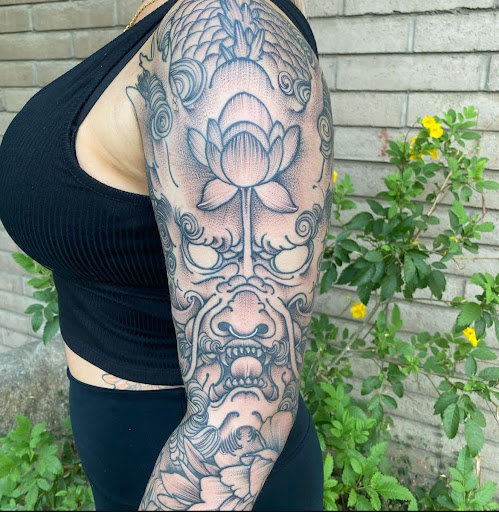 Explore yellow rose tattoo ideas, creative tattoo ideas in Fresno, available at American High Voltage Tattoo