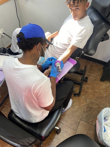Explore grim reaper sleeve tattoo ideas, creative tattoo ideas in Fort Wayne, available at Grade A Tattoos and Body Piercing