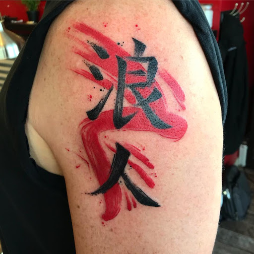 Find lion hand tattoo ideas for men for your next unique tattoo in Lakeland at Black Swan Tattoo