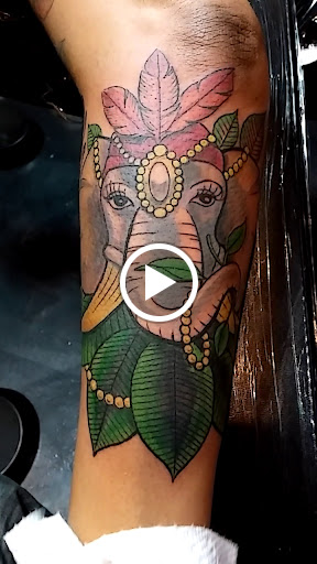 Find tattoos under the breast ideas for your next unique tattoo in Detroit at Detroit Ink Spot