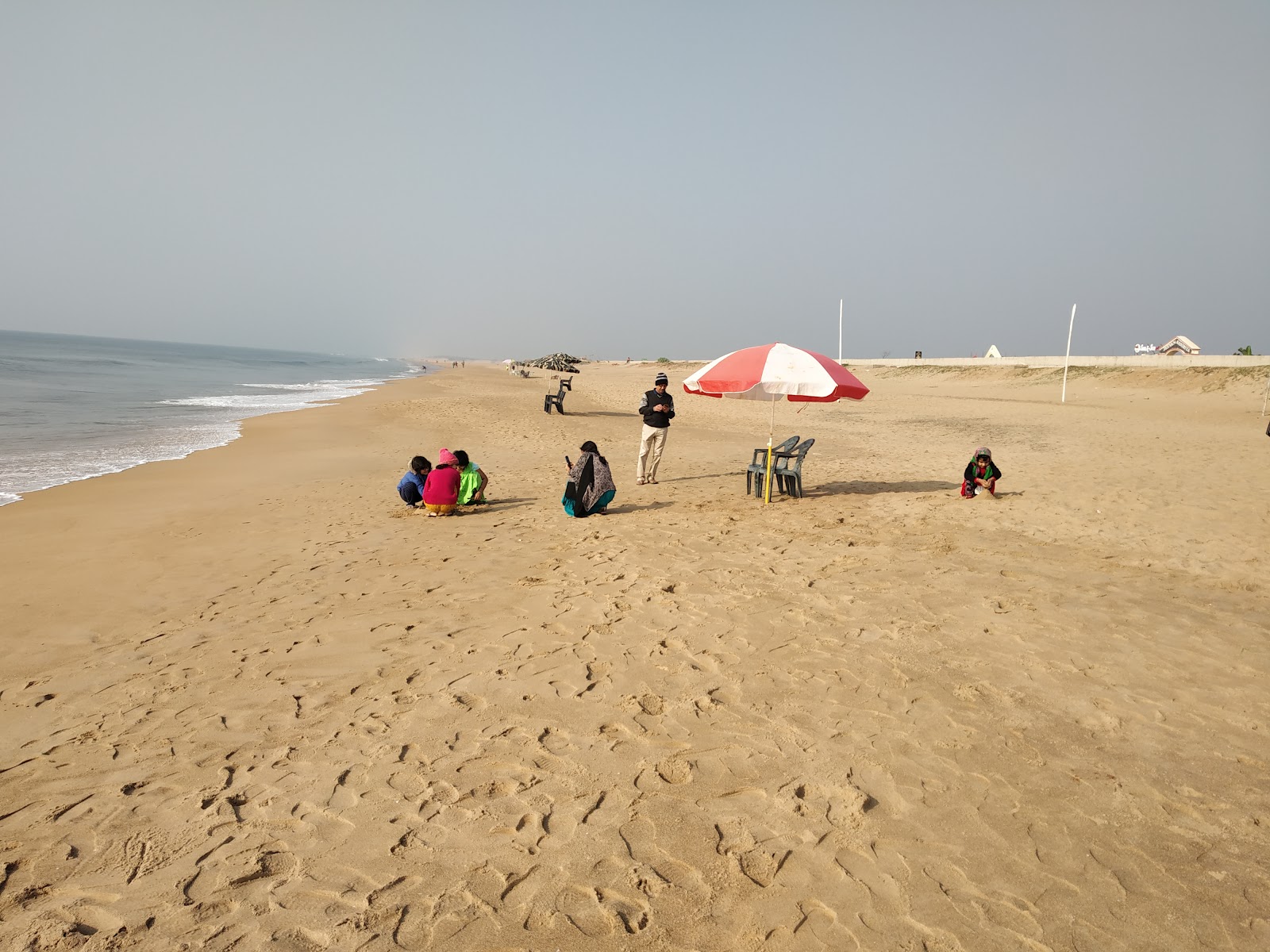 Foto von Muhana Beach mit langer gerader strand