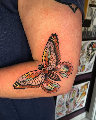 Explore military dog tag tattoo ideas, creative tattoo ideas in Georgetown, available at Iron Rite Tattoo South