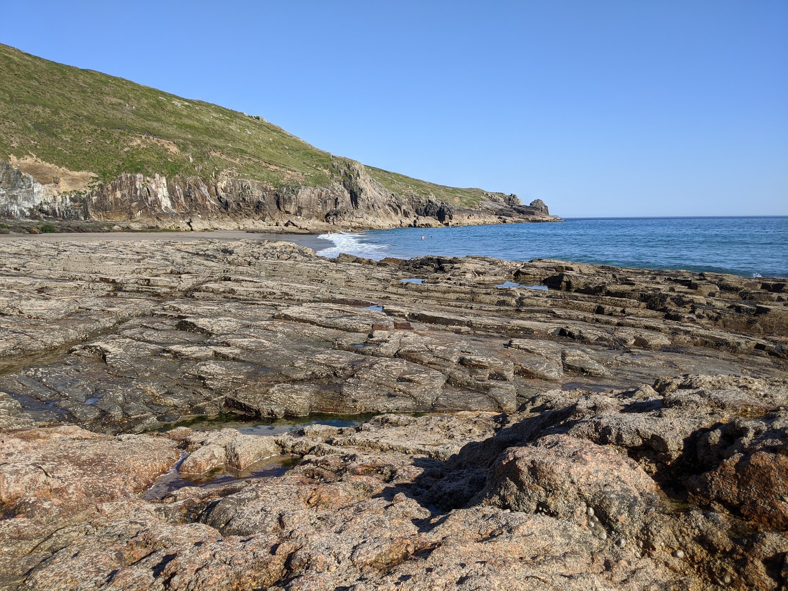 Foto af Rinsey Cove og dens smukke landskab