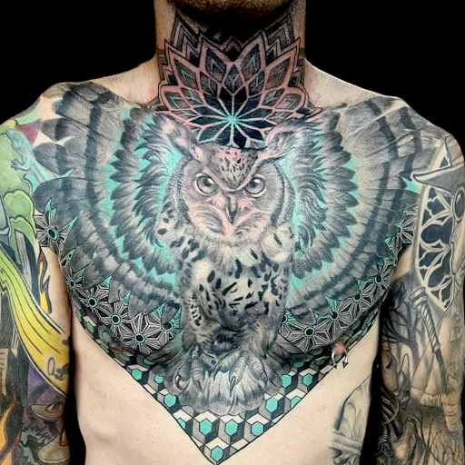 Explore cliff tattoo ideas, creative tattoo ideas in Dubuque, available at The Crows Nest