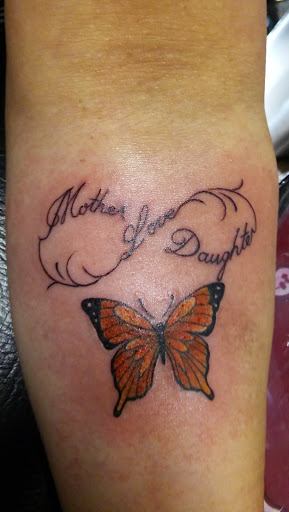 Explore spouse name tattoo ideas, creative tattoo ideas in Las Vegas, available at Blue Buddha Tattoo