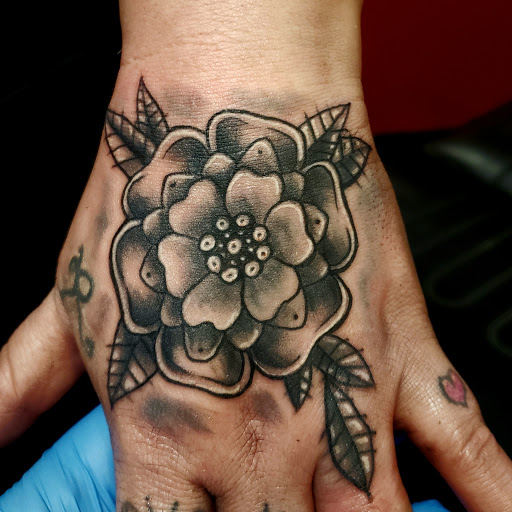 Explore collarbone tattoo ideas for men, creative tattoo ideas in Iowa Falls, available at BiPolar Studios