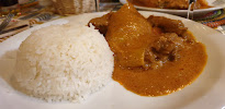 Poulet au curry du Restaurant de spécialités d'Afrique de l'Ouest Le Village à Paris - n°17
