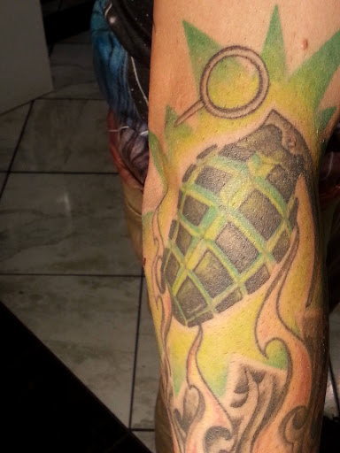 Explore hammerhead shark tattoo ideas, creative tattoo ideas in Tucson, available at Sacred Art Tattoo Studio